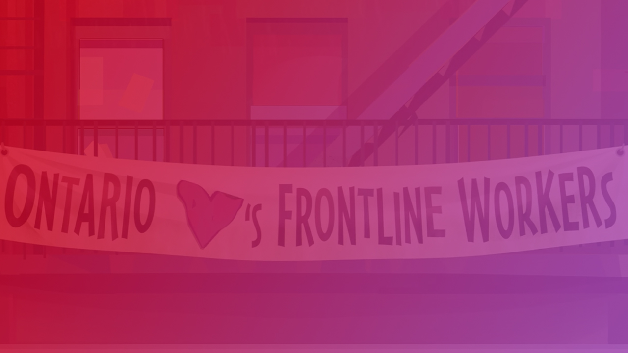 Ontario Hearts Frontline Workers banner hanging from a fire escape